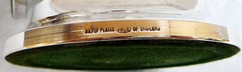 A Pair of Silver Plated Candle Holders by IANTHE