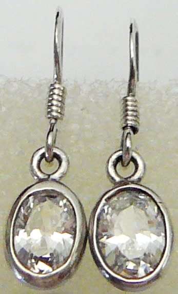 A Pair Sterling Silver Earrings set With Oval Cut Brilliant CZ's