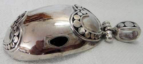 An Unusual Oval Sterling Silver Pendant