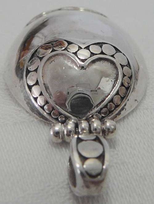 An Unusual Oval Sterling Silver Pendant