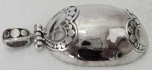 An Unusual Oval Sterling Silver Pendant