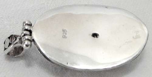 An Unusual Oval Sterling Silver Pendant