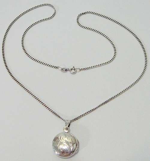Splendid Sterling Silver Decorated Locket and Chain