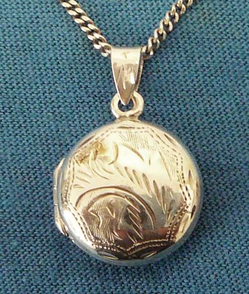 Splendid Sterling Silver Decorated Locket and Chain