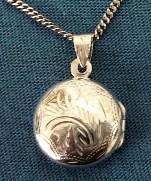 Splendid Sterling Silver Decorated Locket and Chain
