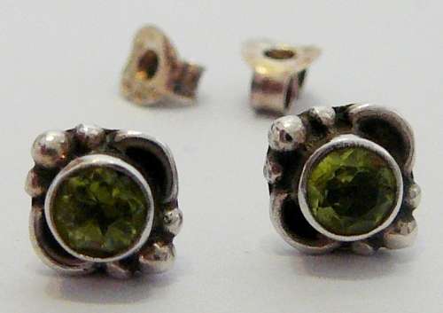 Neat Pair of Sterling Silver Earrings set with Peridot Stones
