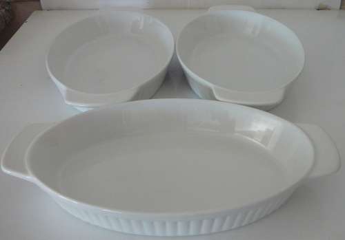 A trio of White oval Vegetable Serving Dishes