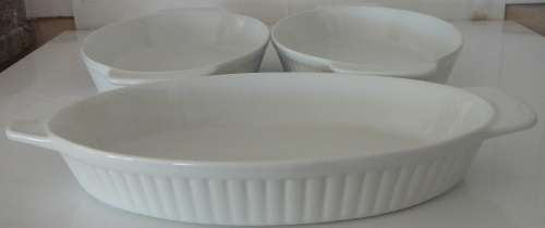 A trio of White oval Vegetable Serving Dishes