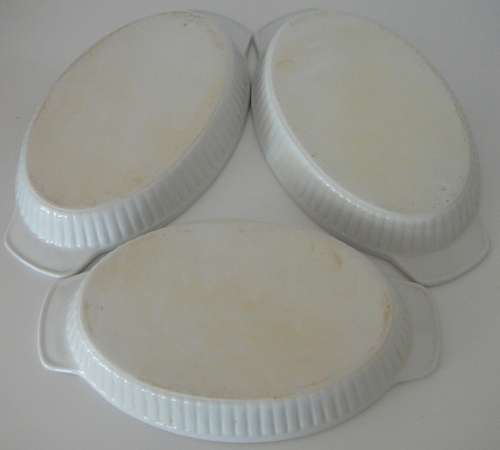 A trio of White oval Vegetable Serving Dishes