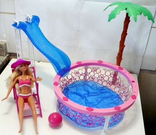 Barbie in Her Bikini next to The Pool