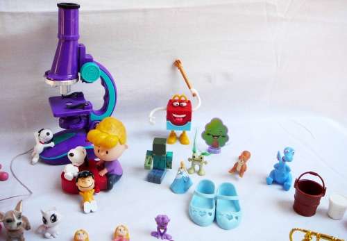 59 Pieces of Mixed Toys - Snoopy, Lucy and Schroeder and a Toy Microscope
