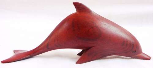 An Exquisitely Carved Wooden Dolphin