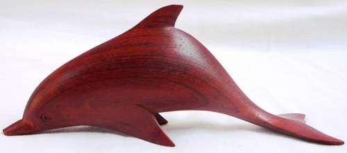 An Exquisitely Carved Wooden Dolphin