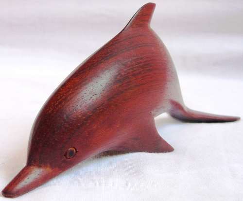 An Exquisitely Carved Wooden Dolphin