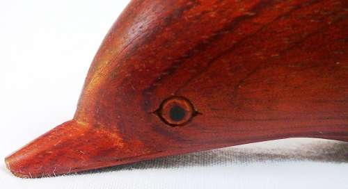 An Exquisitely Carved Wooden Dolphin