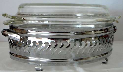 An Anchor Hocking Oval Casserole Dish in Stainless Steel Stand