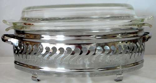 An Anchor Hocking Oval Casserole Dish in Stainless Steel Stand