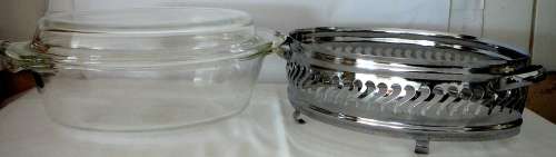 An Anchor Hocking Oval Casserole Dish in Stainless Steel Stand