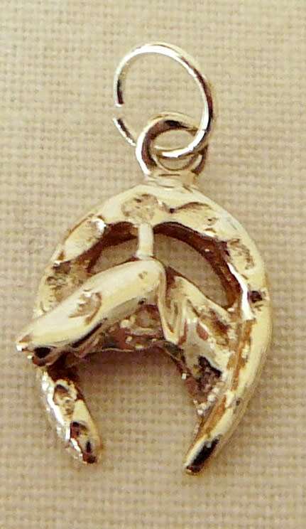 A Sterling Silver Charm - A Lucky Horse Shoe with Horses Head