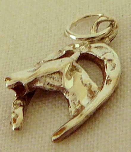A Sterling Silver Charm - A Lucky Horse Shoe with Horses Head