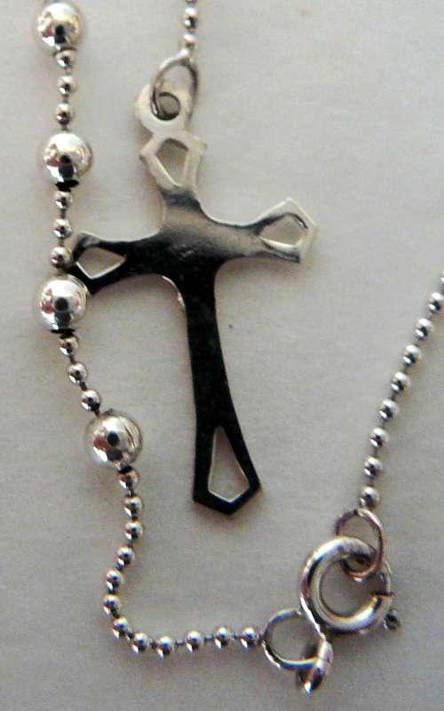 A Sterling Silver Rosary Necklace Chain and Cross