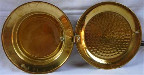 A Brass Bed Warmer With Wooden Handle