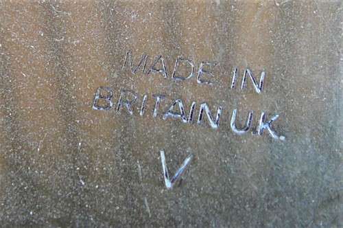 A Brass Bed Warmer With Wooden Handle