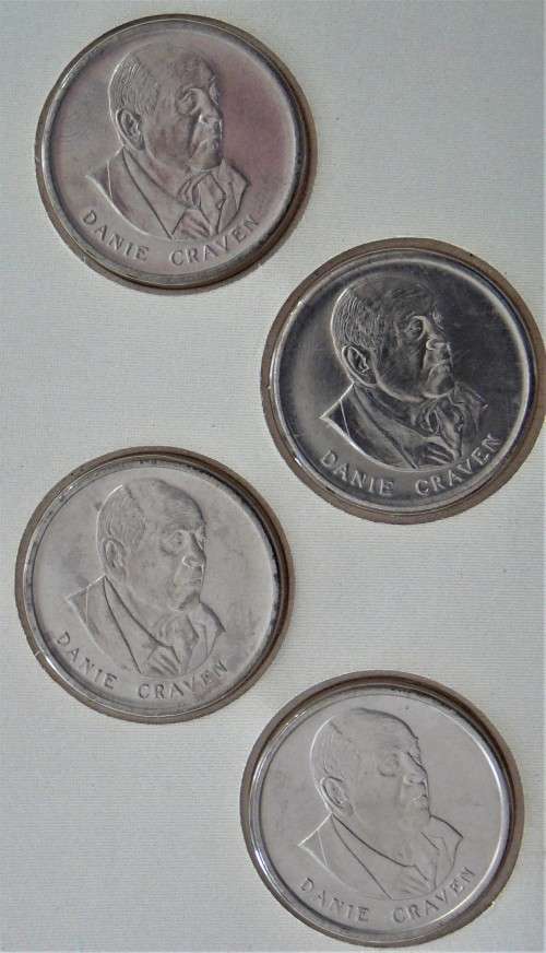 A Carded Set of 4 Danie Craven Commemorative Medals