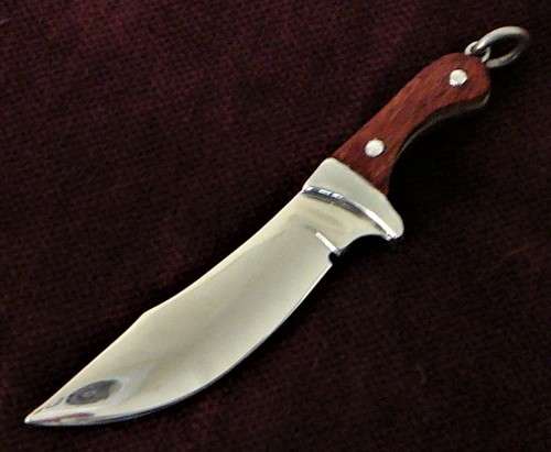 A Stunning Sterling Silver Miniature Knife with Rosewood Handle Pendant