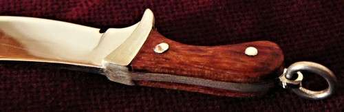 A Stunning Sterling Silver Miniature Knife with Rosewood Handle Pendant