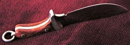 A Stunning Sterling Silver Miniature Knife with Rosewood Handle Pendant