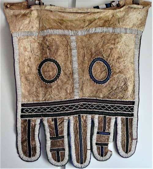 A Hand Made Leather and Glass  Bead Wall Hanging