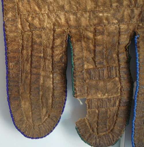 A Hand Made Leather and Glass  Bead Wall Hanging