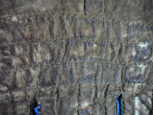 A Hand Made Leather and Glass  Bead Wall Hanging