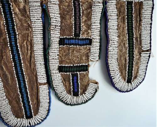 A Hand Made Leather and Glass  Bead Wall Hanging