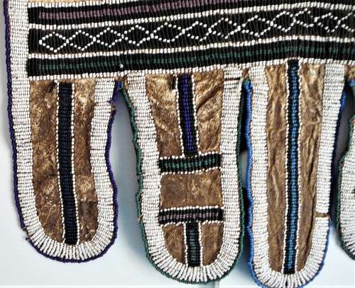 A Hand Made Leather and Glass  Bead Wall Hanging