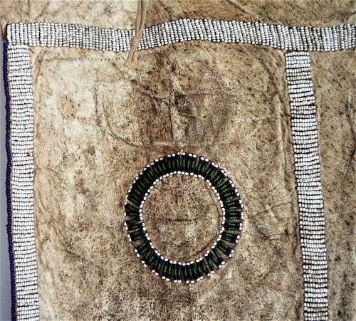 A Hand Made Leather and Glass  Bead Wall Hanging