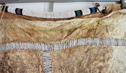 A Hand Made Leather and Glass  Bead Wall Hanging