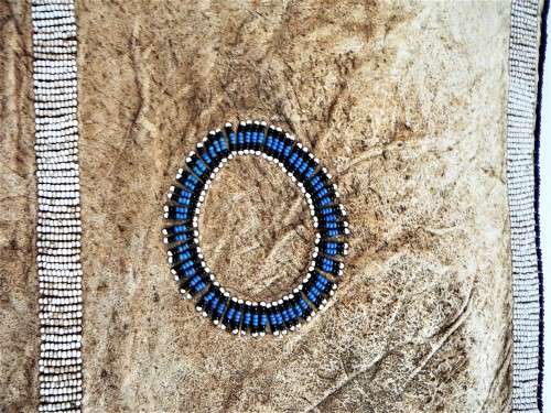 A Hand Made Leather and Glass  Bead Wall Hanging