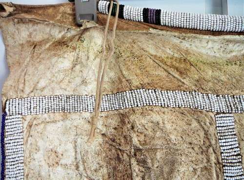 A Hand Made Leather and Glass  Bead Wall Hanging