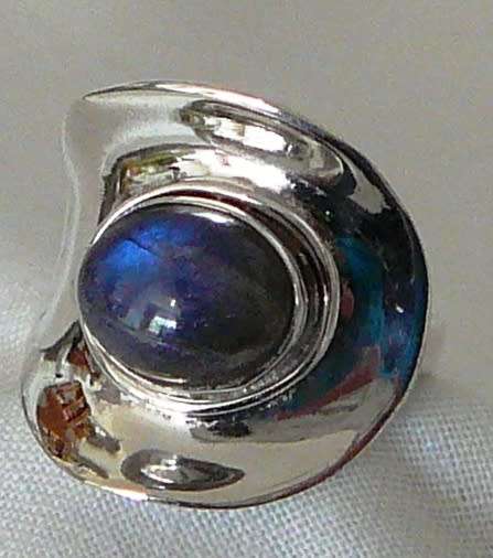 A Beautiful Sterling Silver Ring set with a Cabuchon Cut Lupis Stone