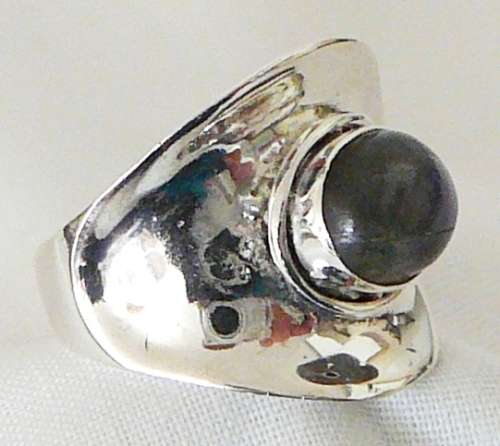 A Beautiful Sterling Silver Ring set with a Cabuchon Cut Lupis Stone