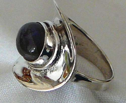 A Beautiful Sterling Silver Ring set with a Cabuchon Cut Lupis Stone