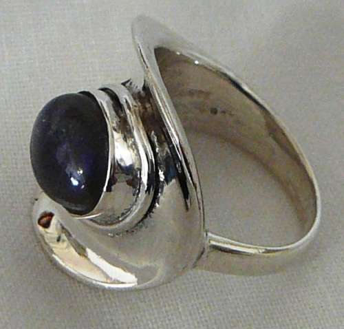 A Beautiful Sterling Silver Ring set with a Cabuchon Cut Lupis Stone