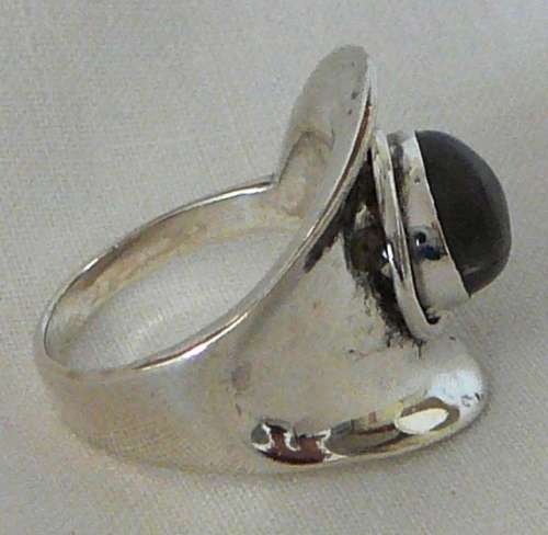 A Beautiful Sterling Silver Ring set with a Cabuchon Cut Lupis Stone
