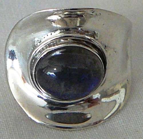 A Beautiful Sterling Silver Ring set with a Cabuchon Cut Lupis Stone