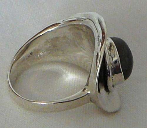 A Beautiful Sterling Silver Ring set with a Cabuchon Cut Lupis Stone