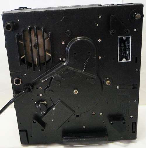 A Hanimex Rondex Slide Projector with 4 Slide Cartridges