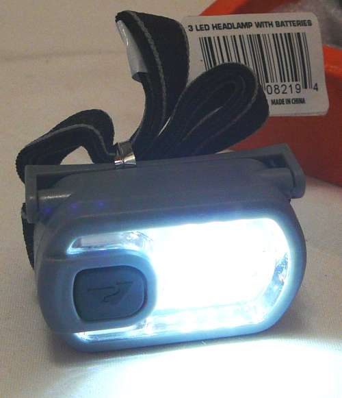 A 3 LED Headlamp with Strap  and Batteries