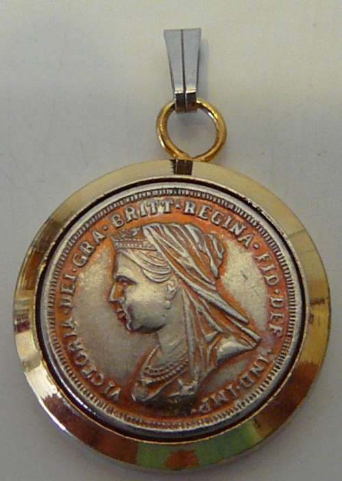 An 18 Ct Gold Plated Coin Pendant